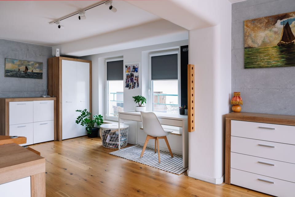 Deluxe Apartment | Living area | 37-inch flat-screen TV with digital channels
