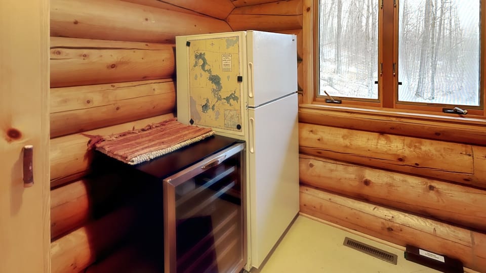 2 extra fridges plus washer and dryer in laundry