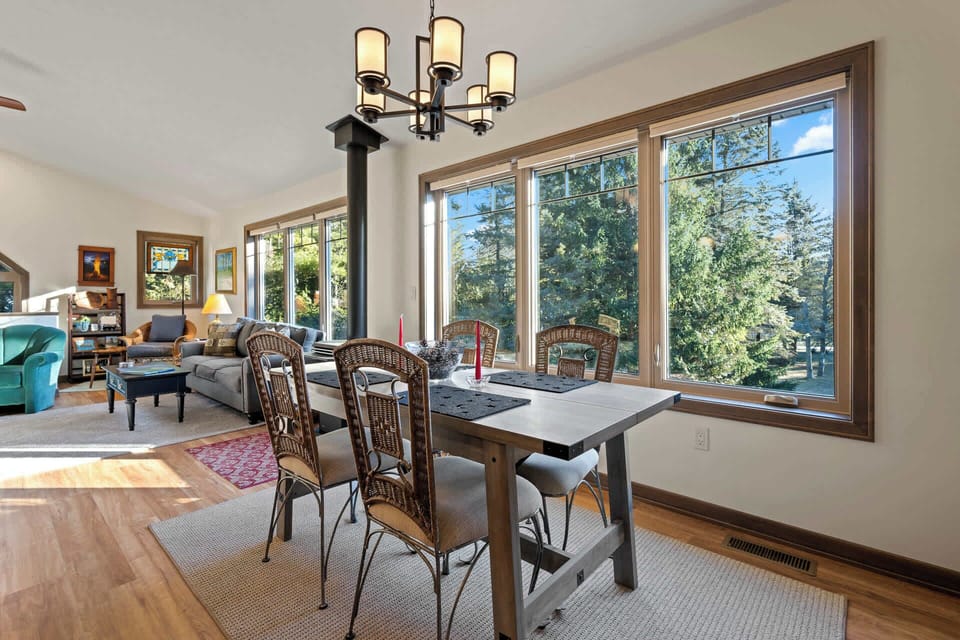 The dining space opens to the kitchen and main living space