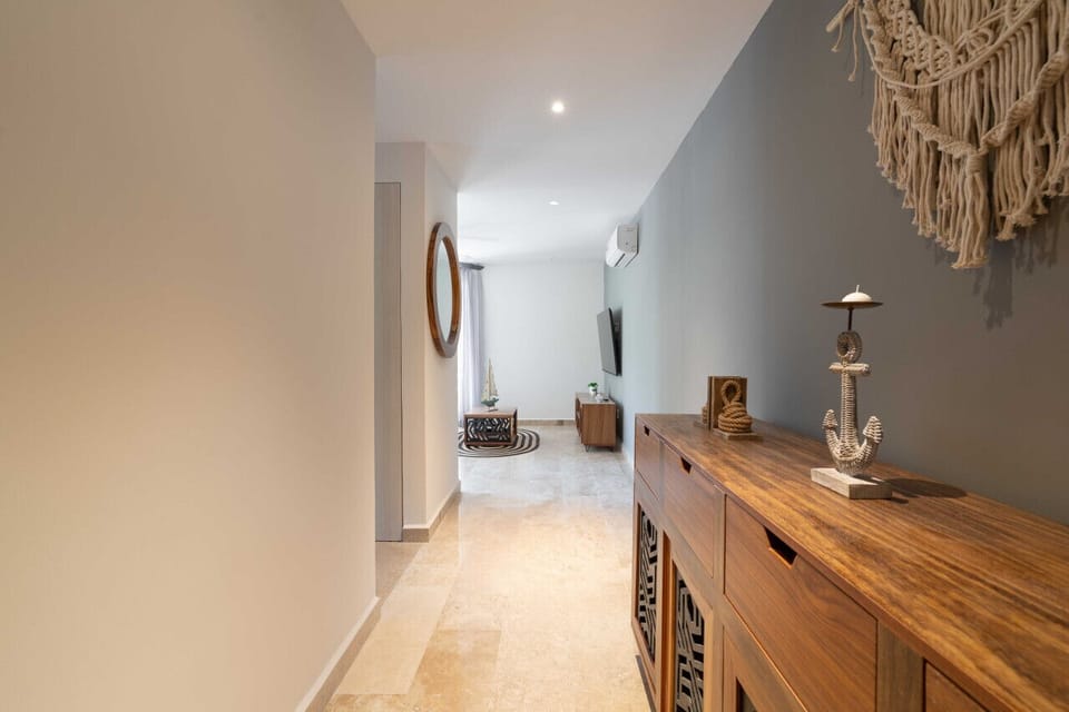 Simplicity meets elegance in our unassuming yet stylish hallway – a tranquil passageway to your peaceful retreat