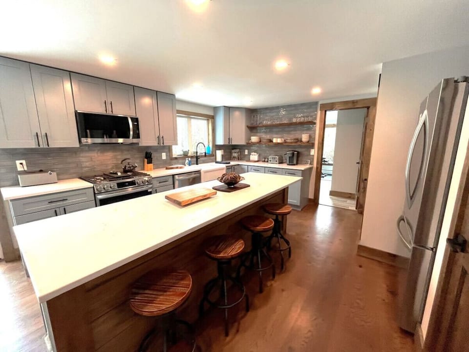 Big kitchen with island that seats 4