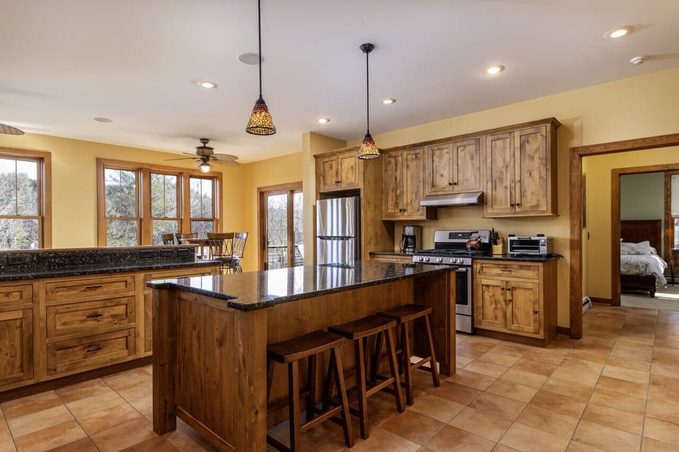 Kitchen overlooking the sitting area and Lake