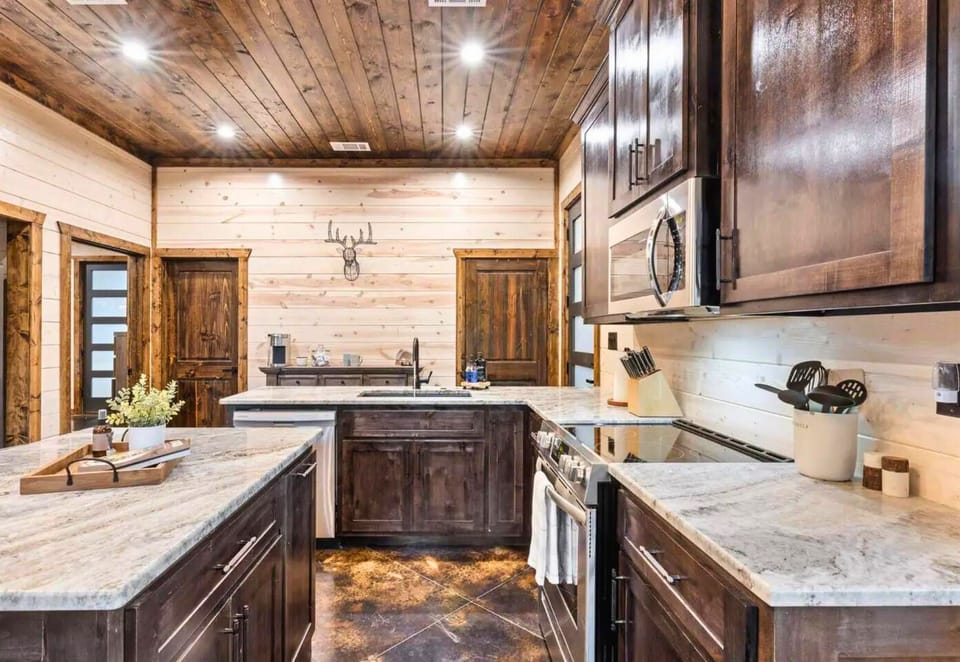 Modern amenities meet rustic charm in our spacious kitchen.