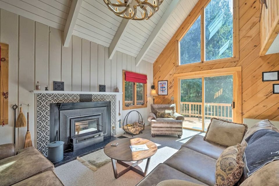 Open living area with wood burning fireplace. Wood provided.