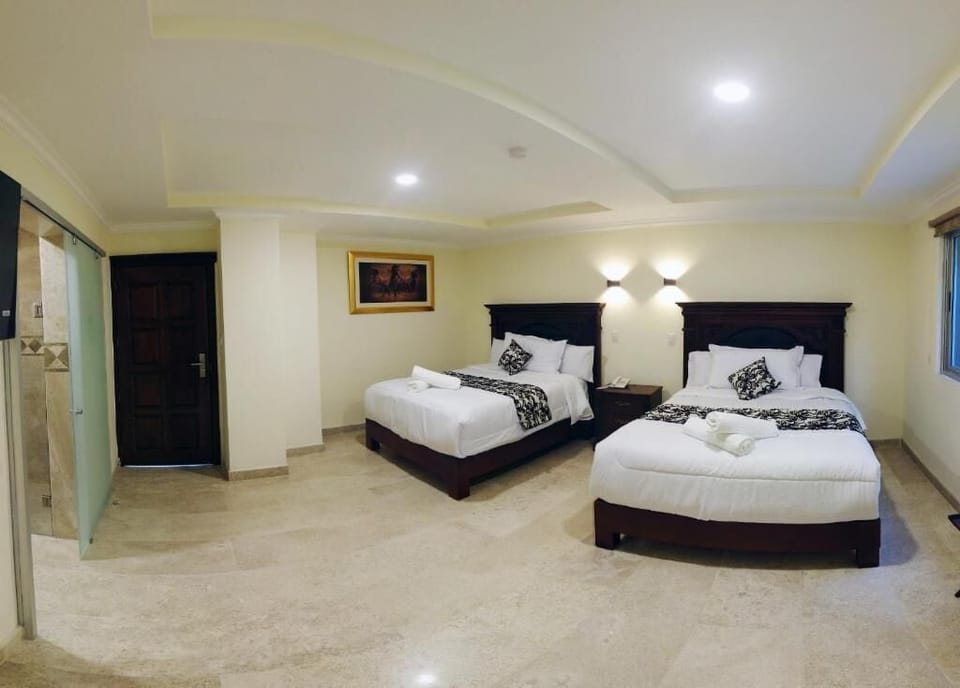 Standard Double Room, 2 Double Beds | In-room safe, WiFi (free), bed sheets