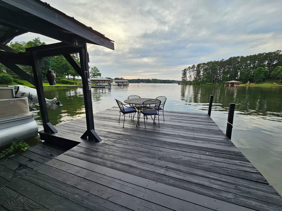 Table seating 4 on the dock. A great place to enjoy lunch. 