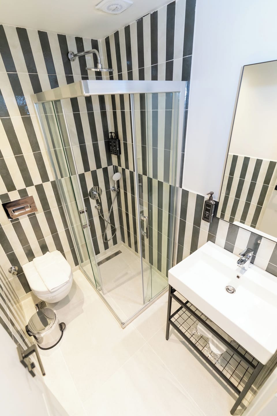 Shower, free toiletries, hair dryer, slippers