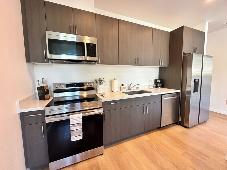 full kitchen with all dishes, utensils and cooking ware