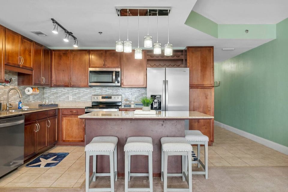 Fully Stocked Kitchen with Ocean Views, Island Bar Seating, Stainless Steel Appliances and Drip Coffee Maker