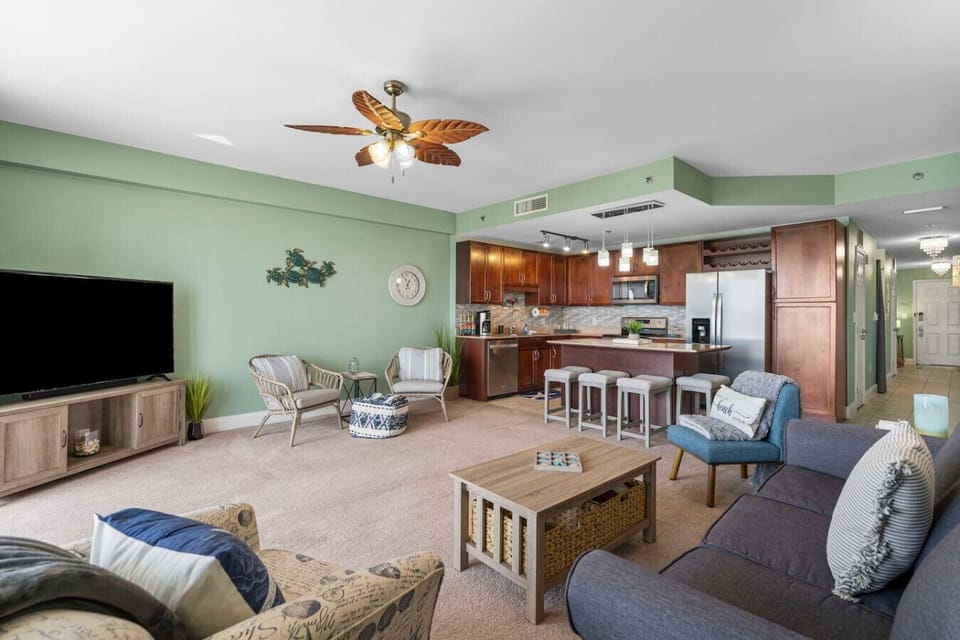 Living Area with Ocean Views, Flat Screen TV, Sleeper Sofa and Private Balcony Access