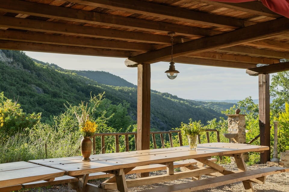 Plant, Sky, Property, Shade, Wood, Natural Landscape, Mountain, Cottage, Wood Stain, Outdoor Furniture