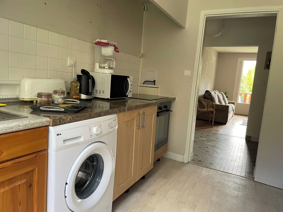 Kitchen looking to hall and sitting room 