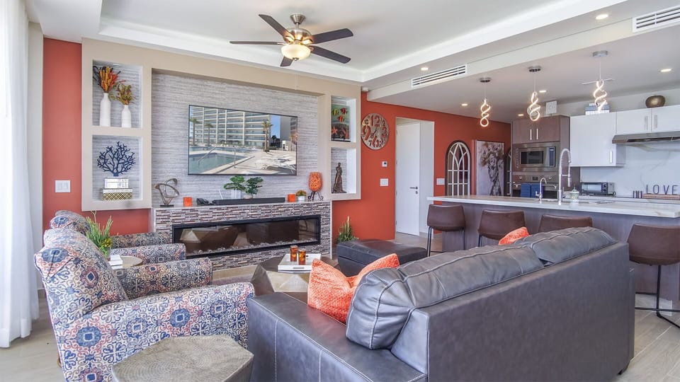 The living room is so stylish and comfy.