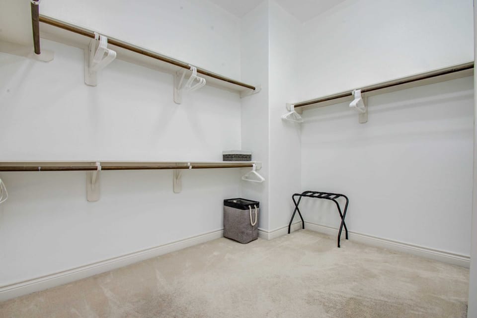 Spacious Walk-In Closet with Ample Storage & Organization