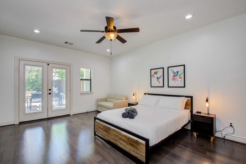 Bright & Spacious Bedroom with Private Patio Access & Modern Touches