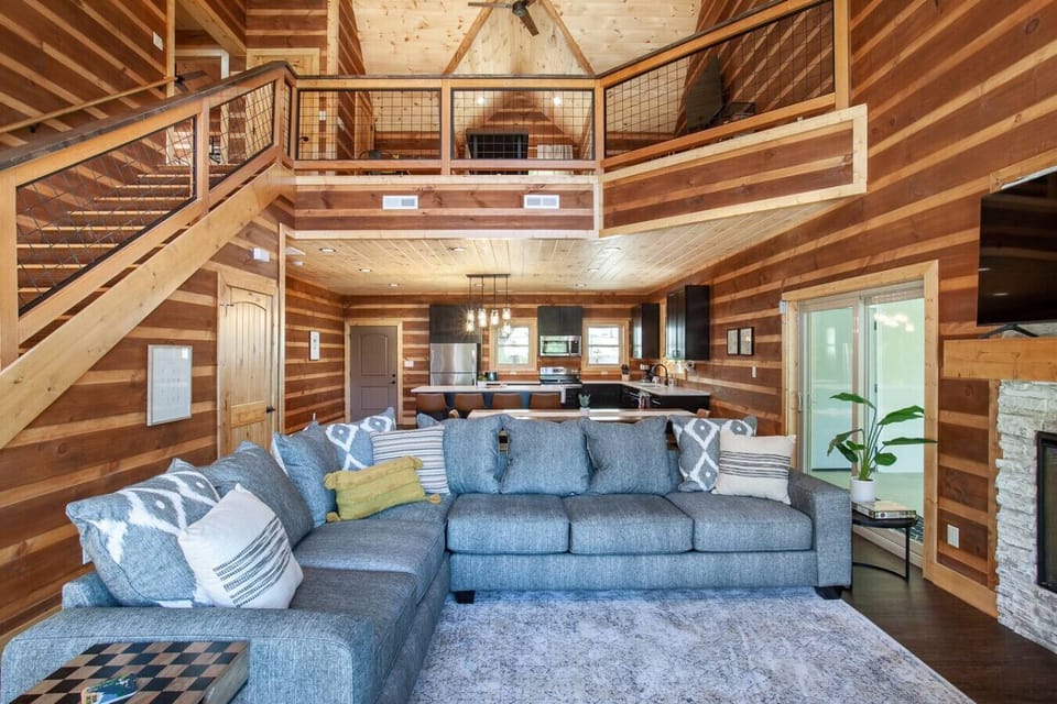 Open concept living area with smart tv and electric fireplace!