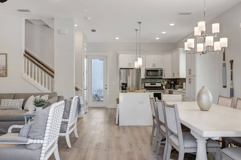 Beautifully decorated open-concept living, kitchen, and dining area