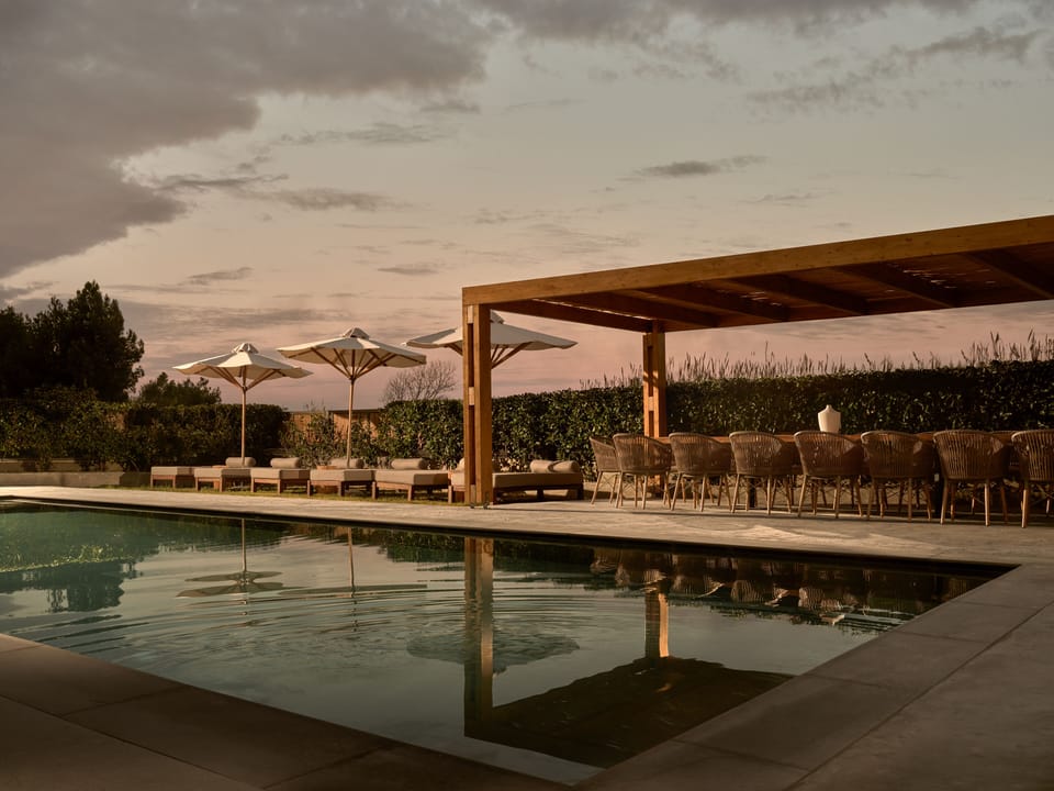 Tranquility unfold at the pool area, with iconic sea views.