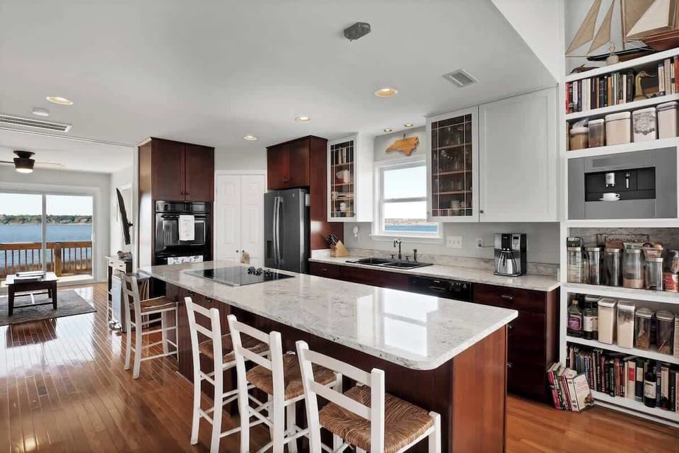 Fully stocked kitchen features modern appliances, sleek countertops, and everything you need for preparing gourmet meals during your stay.