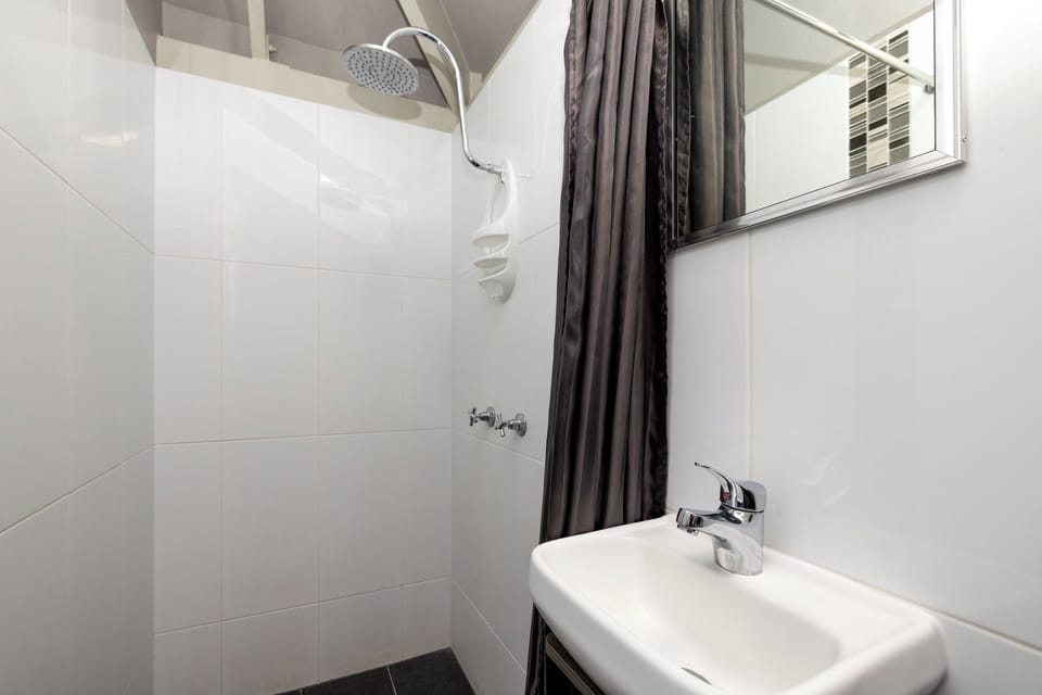 Superior Poolside Studio | Bathroom | Shower, free toiletries, towels, toilet paper