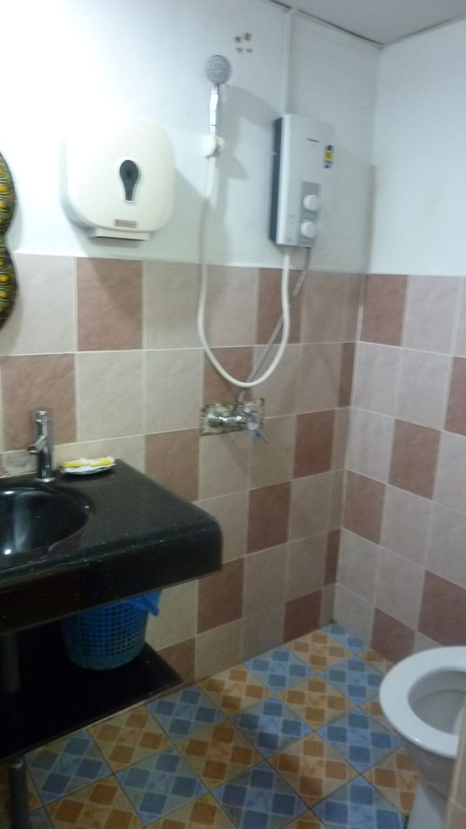Shower, free toiletries, hair dryer, slippers