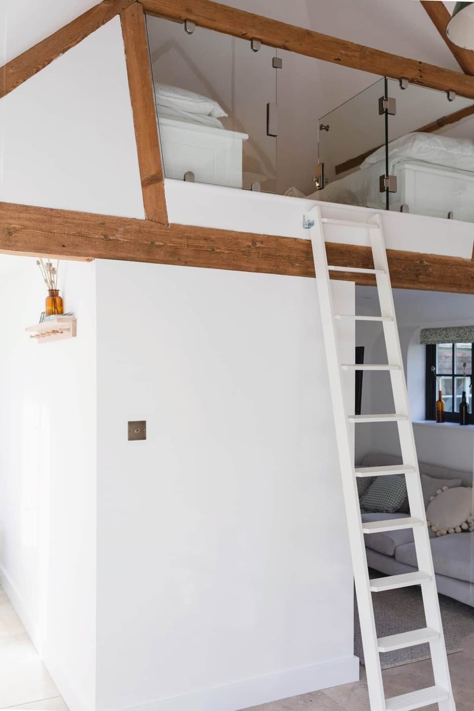 mezzanine sleeping loft featuring two single beds for children with ladder access (1)