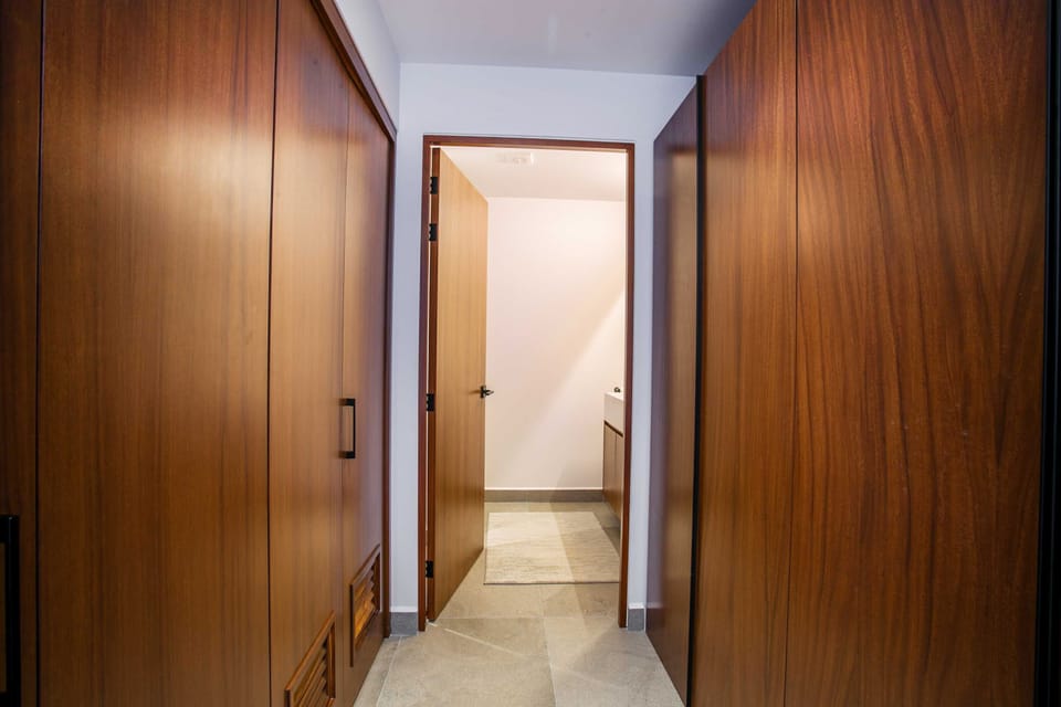 Hall to the bathroom, ample closet space, in-unit washer and dryer