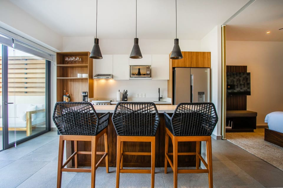 Kitchen amenities include a full-size fridge, stove, oven and dishwasher