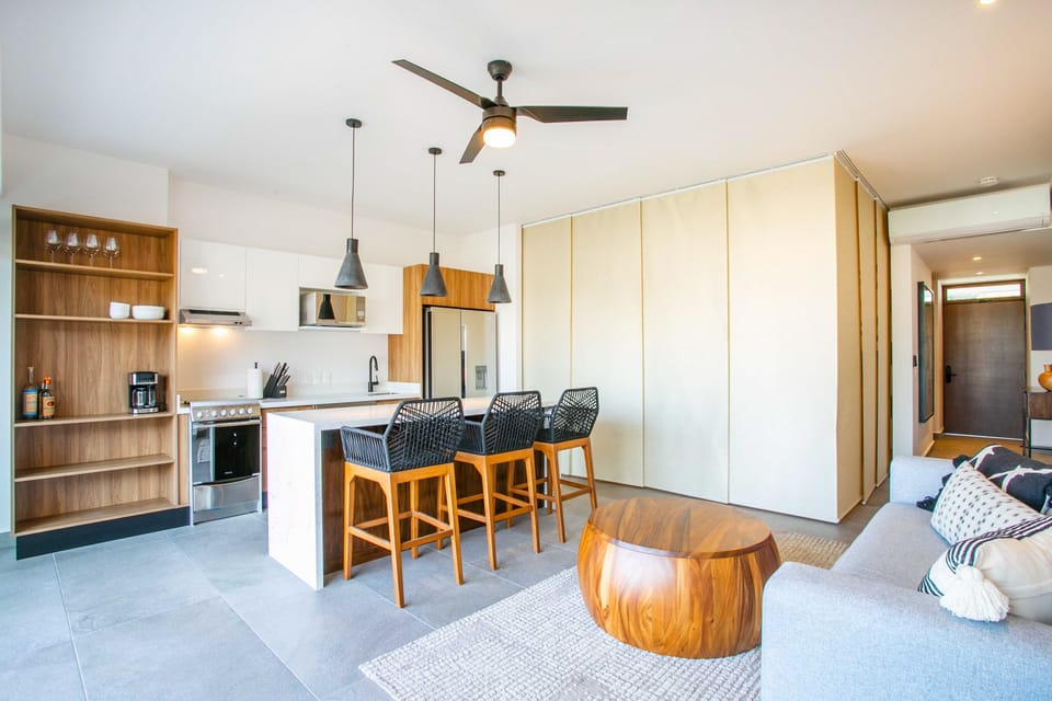 A sliding door separates the bedroom from the kitchen to add privacy