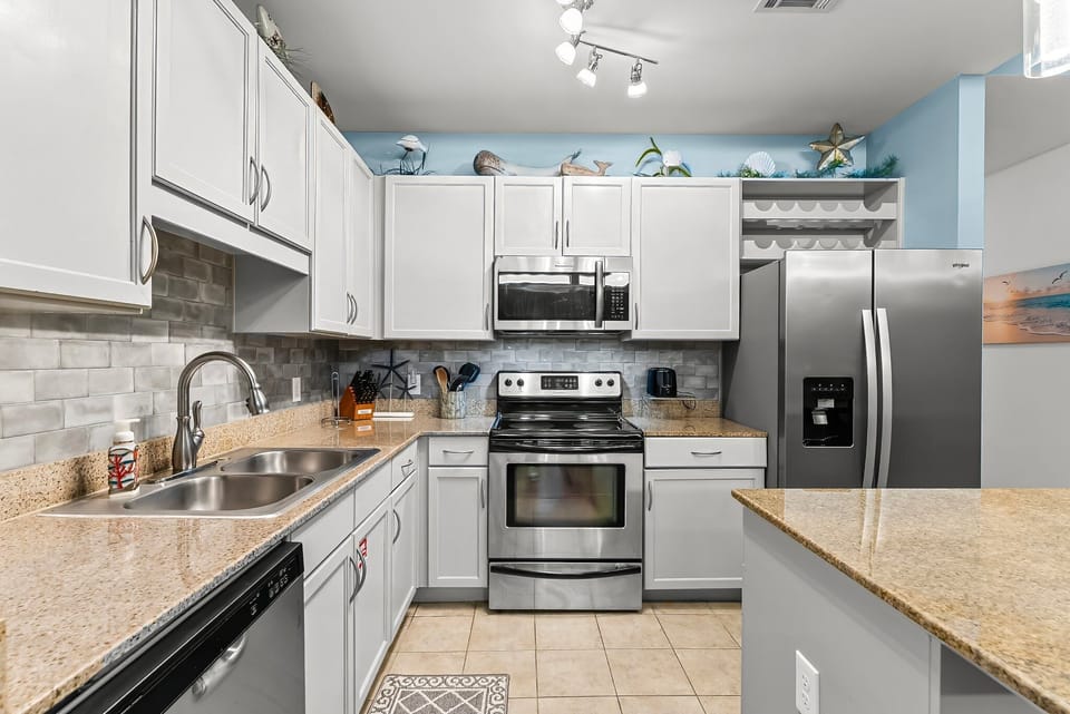 Modern kitchen with stainless steel appliances and ample counter space
