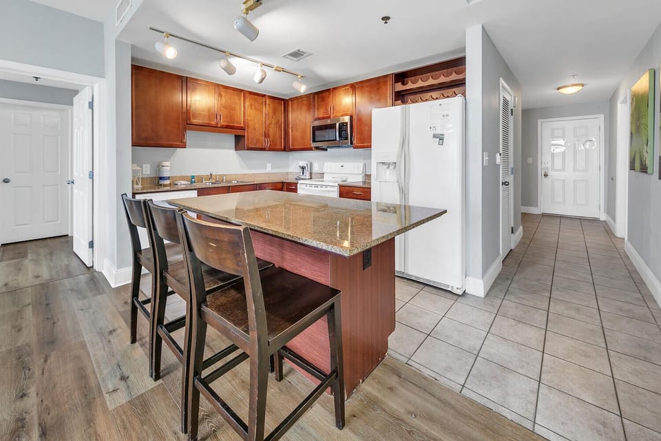 Kitchen with eat-in bar stools