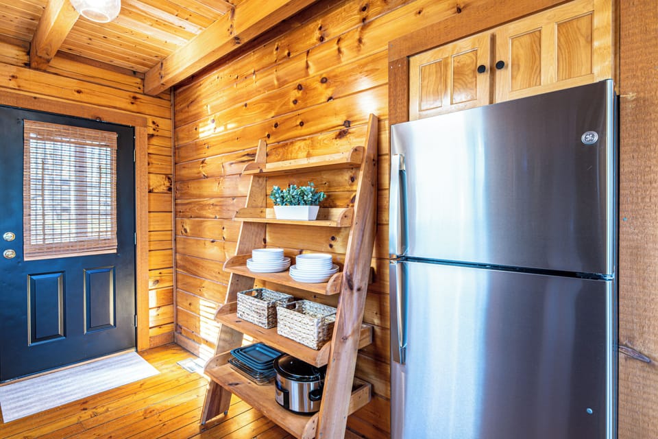 Modern appliances and a fully stocked kitchen.