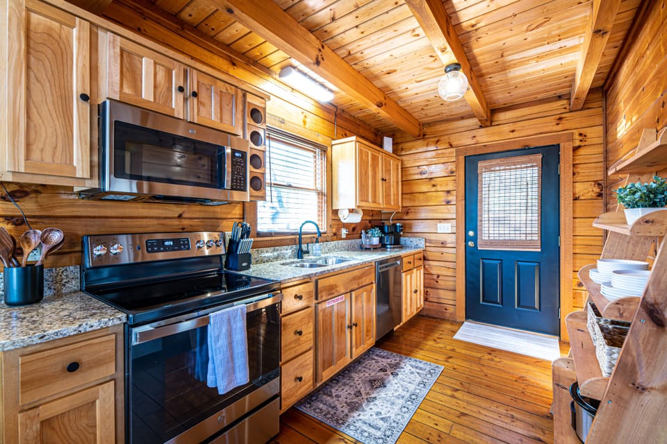 Dishwasher, microwave, electric stove, oven, and refrigerator are brand new. 