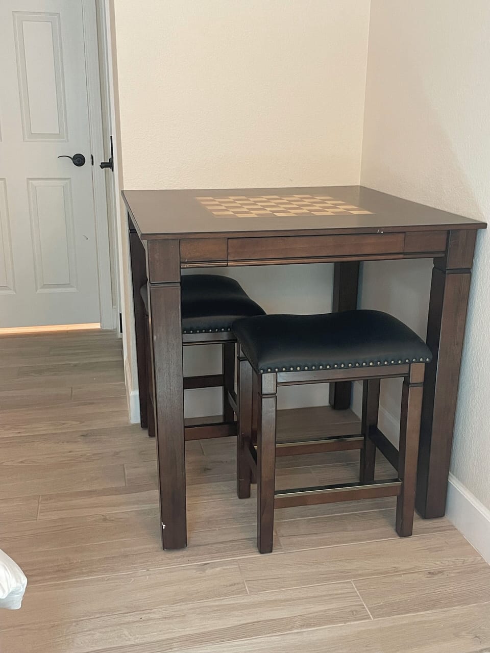 Game Table (chess and checkers pieces located in drawer of table) located in Second Bedroom