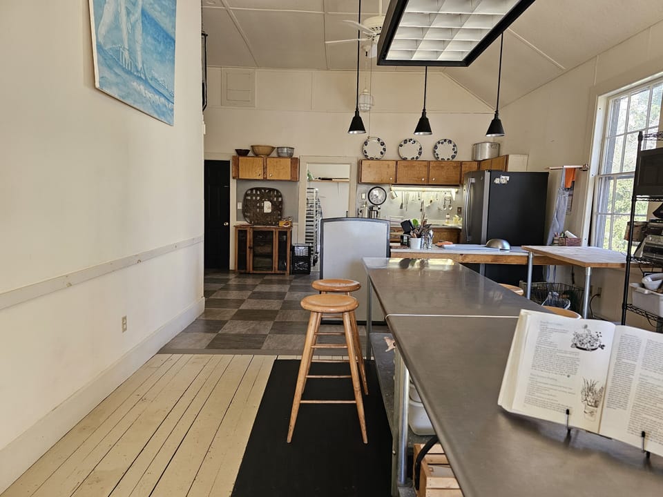 Long view of the loft. A dedicated work station is just out of view . Good wifi.