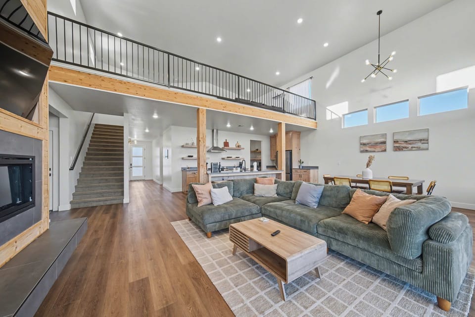 We love our open concept living, kitchen and dining room. Furnished with a comfy couch, large dining room and all kitchen appliances.