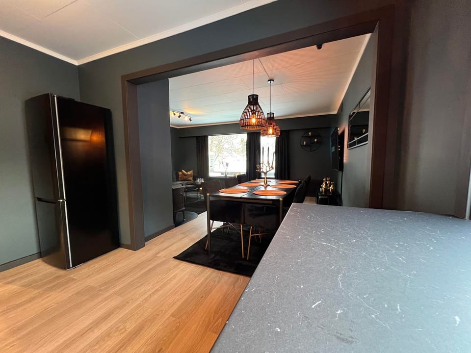 Deluxe Villa | Living area | Flat-screen TV