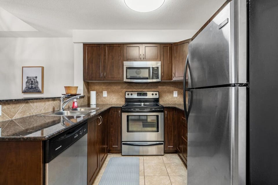 Full kitchen with an electric fondue set, air fryer, blender, crockpot/slow cooker, Keurig, Nespresso & drip coffee machines, ground coffee, tea, sugar and basic condiments (ketchup, mustard and relish.)