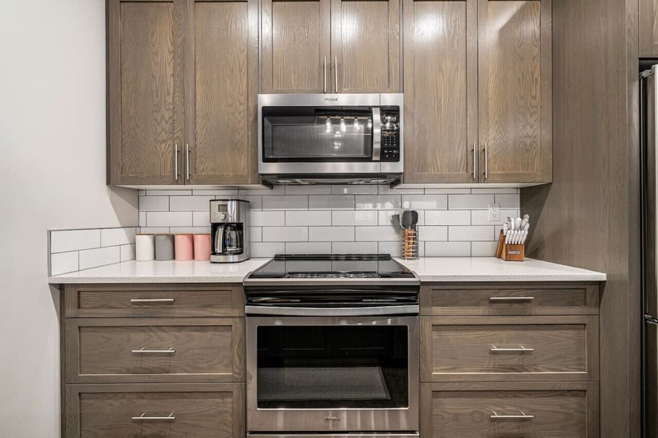 Full kitchen with all of the essentials plus drip & nespresso coffee machines, blender and a crockpot.
