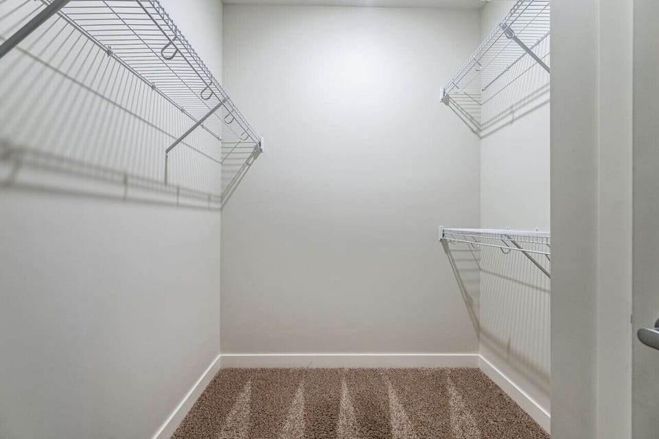Primary bedroom, located upstairs, with a king bed and a private ensuite bathroom.