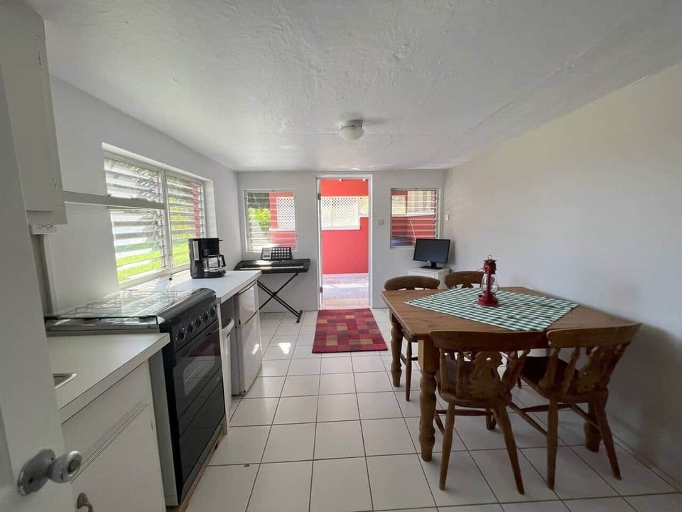 Image shows Lower Floor Apartment-Kitchenette with Dining Table