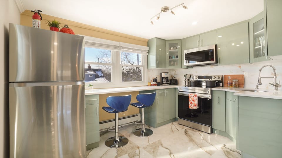 Nice workspace/ counter with bar stools