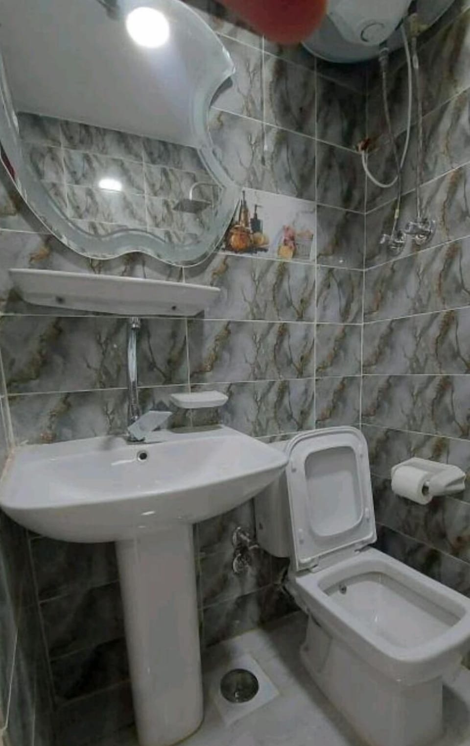 Rainfall showerhead, hair dryer, soap, shampoo