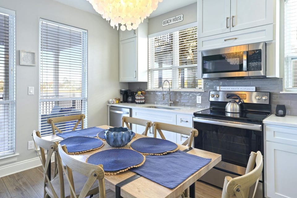 Overlook the lake while enjoying dinner at the dining table that seats six.