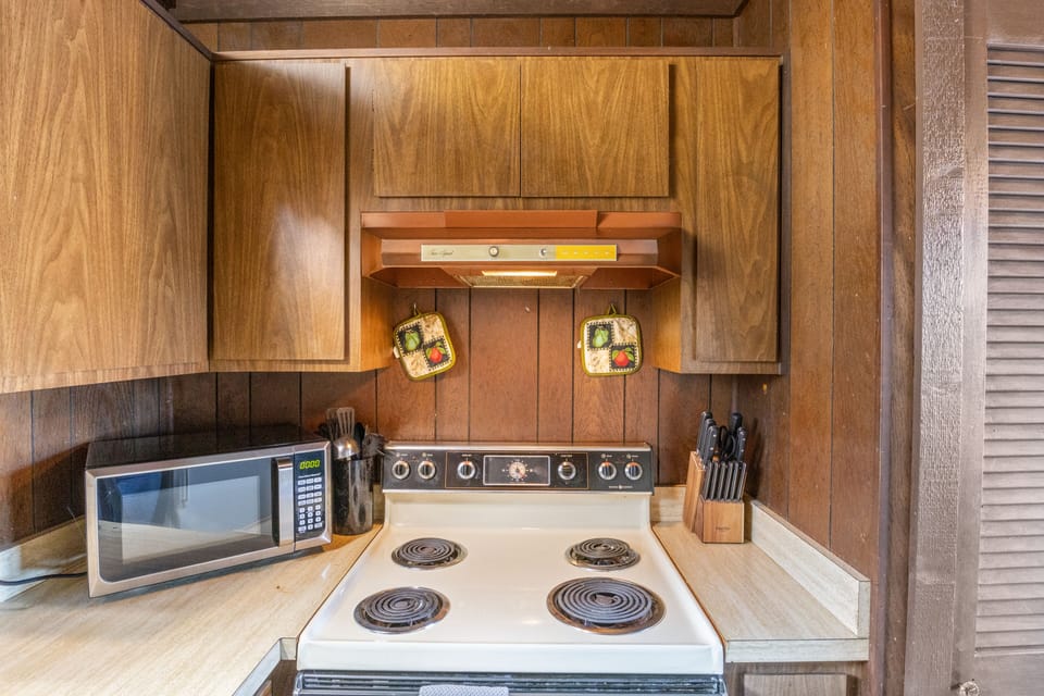 From the stove, microwave, oven and other amenities, the kitchen is fully stocked to inspire your inner chef.