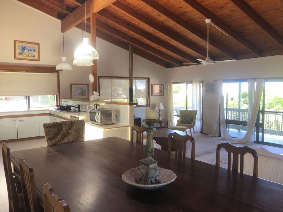 Raked ceilings and ceiling fans to lounge area 