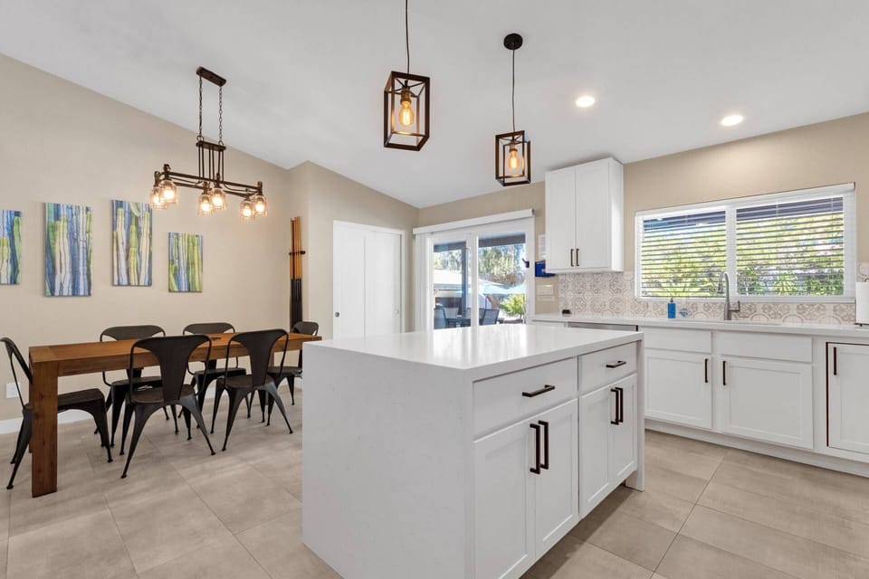 Open kitchen with beautiful cabinets and countertops!