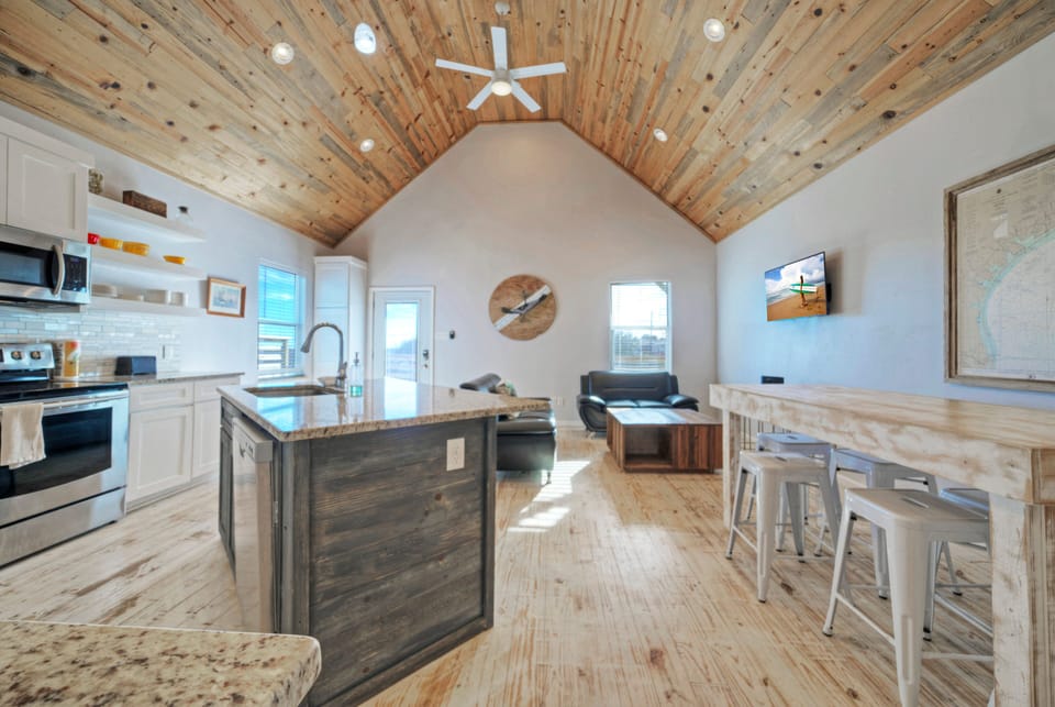 Gather with your guests in the open floor plan.