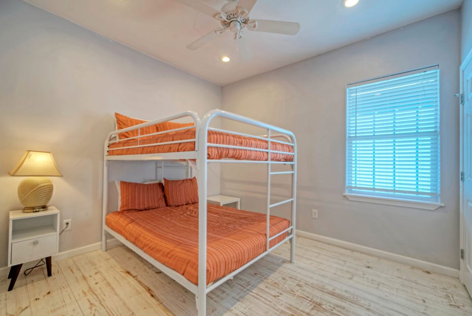 Bedroom 2 features a full over full bunk bed.