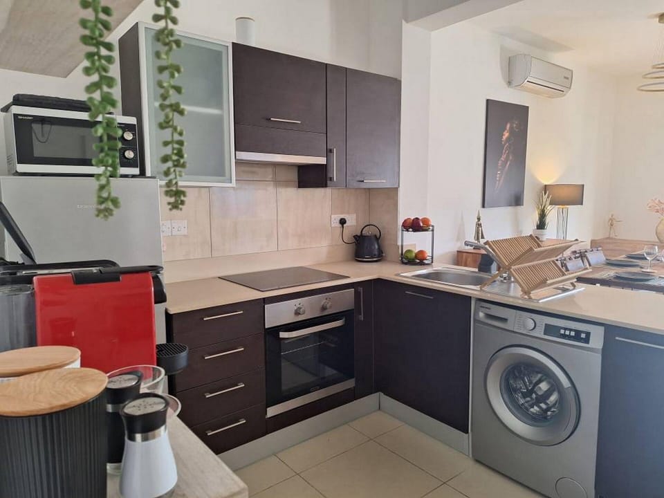 Family Apartment | Private kitchen | Espresso maker, coffee/tea maker, full-size fridge, microwave